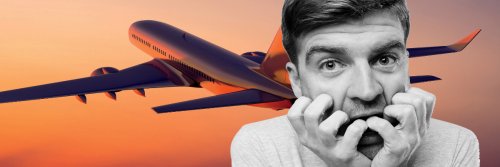 7 Tips For The Fear Of Flying - 7 Tips to Overcome the Nail-Biting Fear Of Getting On A Plane - The Wise Traveller - Man biting his nails out of fear