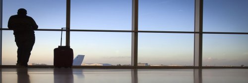 Tips For The Travelling Lone Ranger - Travelling Solo Tips for the Macho Male - The Wise Traveller - Man at airport