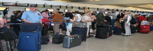 Worst Airports For Business Travellers - The Wise Traveller - Busy Airport Lobby