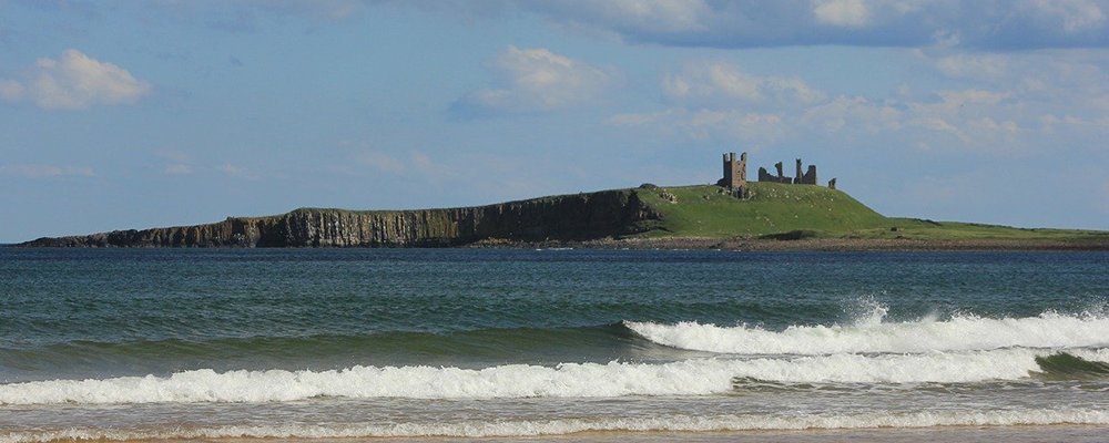 10 Amazing National Parks in the U.K. - The Wise Traveller - Northumberland - Dunstanburgh castle