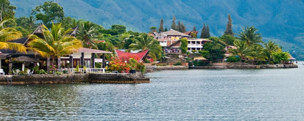 10 Places You Didn't Know To Visit - Places You Never Knew You Wanted To Visit - The Wise Traveller - Lake Toba, Parapet, Indonesia