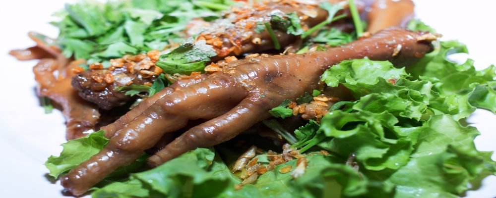 25 'Exotic' Dishes When Travelling - Top 25 Strange Foods When You Travel - The Wise Traveller - Asia, South America, Africa - Chicken Feet