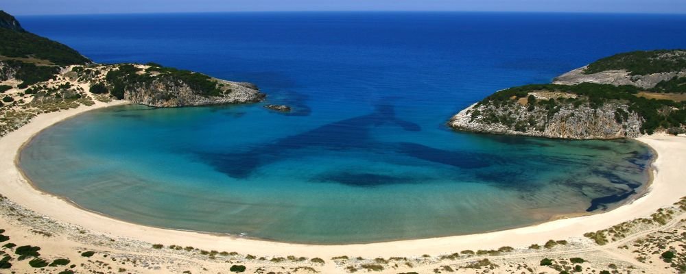 5 Summer Places To Avoid Crowds - How To Avoid The Crowds With These 5 Summer Destinations - The Wise Traveller - Voidokilia Beach - Greece