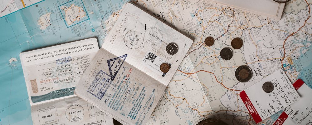6 Passport Tips to Jump Borders - The Wise Traveller - Passport with Stamps