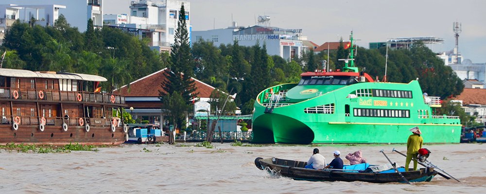 Cai Rang Floating Market of Can Tho, Vietnam - The Wise Traveller - Big green boat