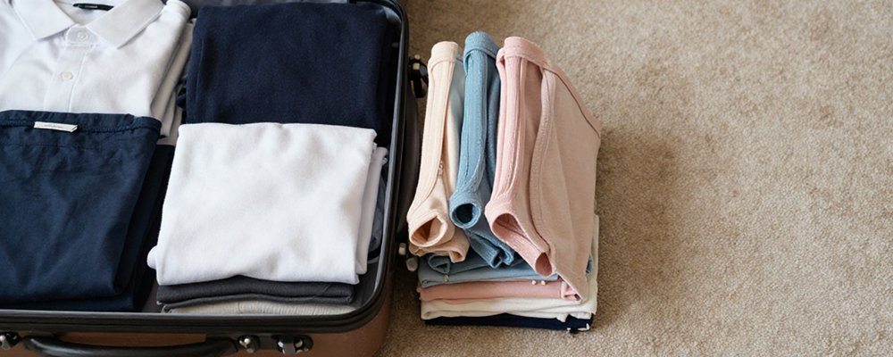 Do You Pack Undies - The Wise Traveller - Suitcase Clothes Layout & Underwear Stack