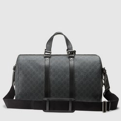 Gucci Supreme canvas carry-on suitcase