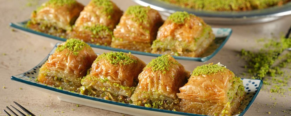 Licking Sweet Fingers Baklava - Southeastern Anatolia, Turkey - The Wise Traveller - Baklava
