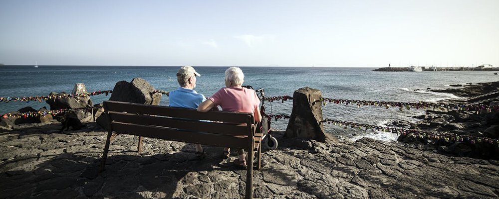 Over 70 Travel Dramas - The Wise Traveller - Old couple on a bench