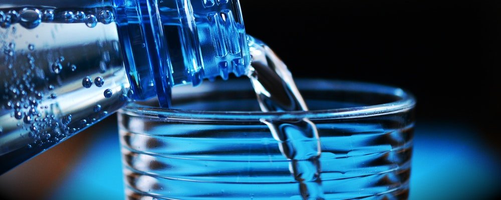 Reminders On Staying Healthy When Travelling - The Wise Traveller - Drinking Bottled water