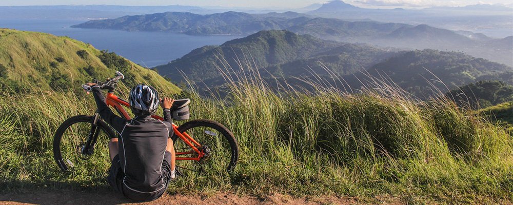 Therapy in Nature - How to Reconnect With Nature Through Camping - The Wise Traveller - Cycling in nature