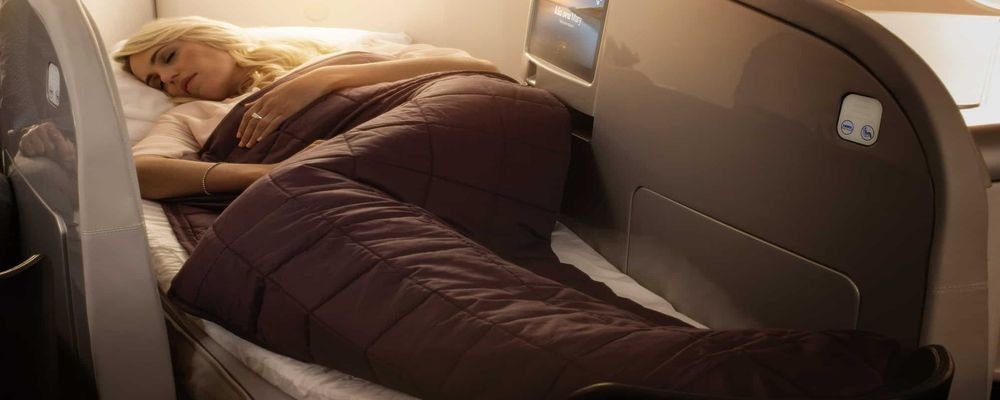 Things To Keep Handy During Long Flights - Carry-on Essentials - The Wise Traveller - Sleeping gear